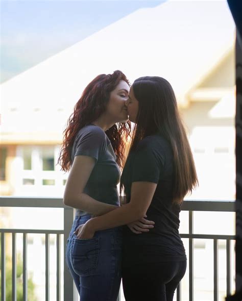 hot lesbian|two attractive lesbian girlfriends passionately kissing and。